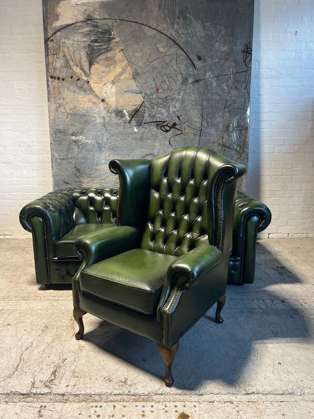 A Rich Green Leather Chesterfield Wing Back Chair