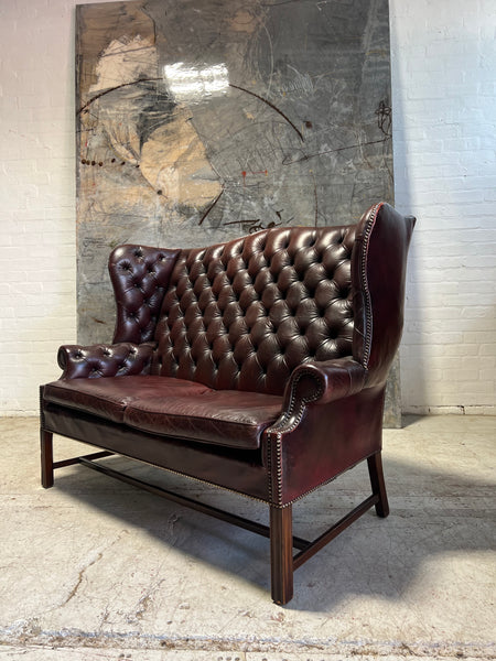 A Very Handsome MidC 2 Seat Wingback Chesterfield Sofa in Hand Dyed Wine Leathers