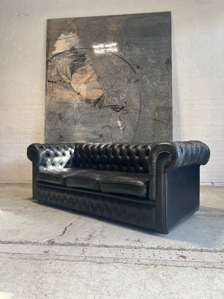 A Great Black Leather Chesterfield Sofa