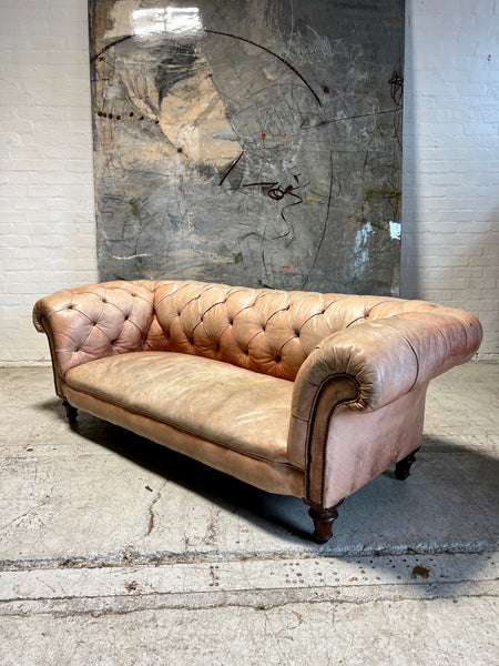 A Waring & Gillow Chesterfield Sofa in Faded Coral Hand Dyed Leathers