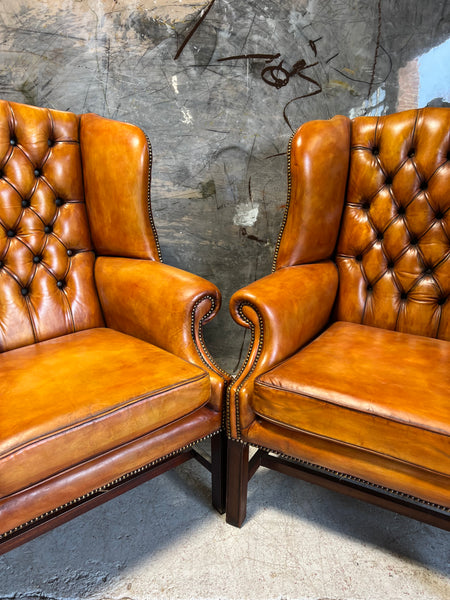 An Stunning Matching Pair of MidC Gentleman’s Wing Chairs in Original Leathers