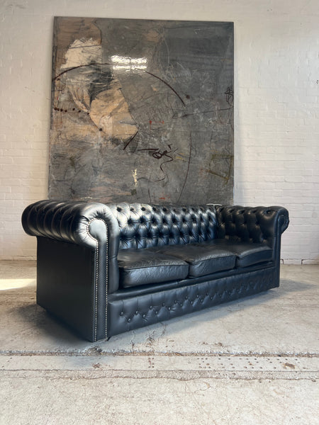 A Great Black Leather Chesterfield Sofa