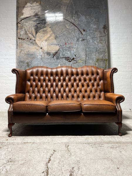 Beautiful Pair of Twice loved Chesterfield Wing Back Sofas in Caramel Tan