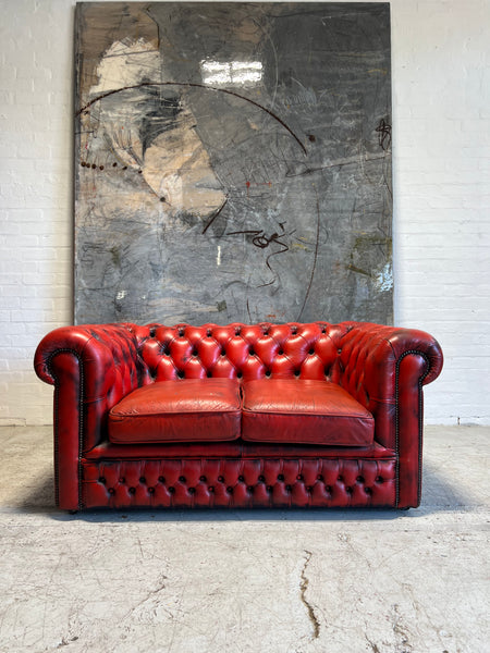 A Lovely Little 2 Seater Leather Chesterfield Sofa in Red