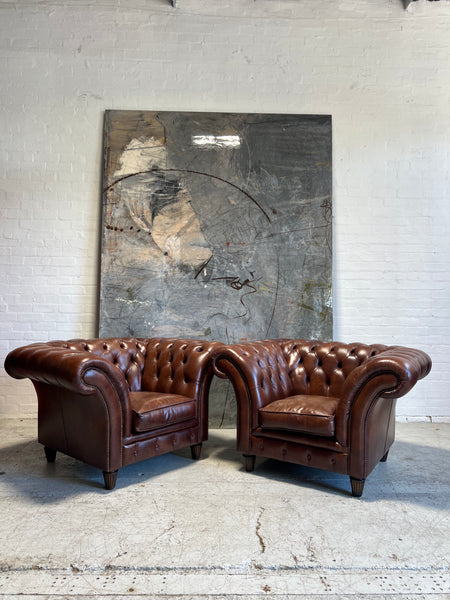 A Super Smart Matching Pair of Large Leather Chesterfield Club Chairs