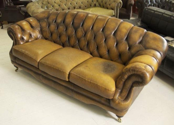 LEATHER SOFA WITH ARCHED BACK IN SADDLE TAN