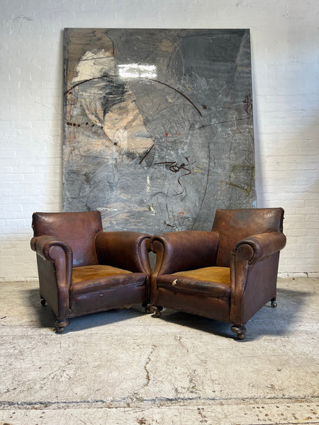 A Robust Pair of Edwardian Armchairs in Original Leather