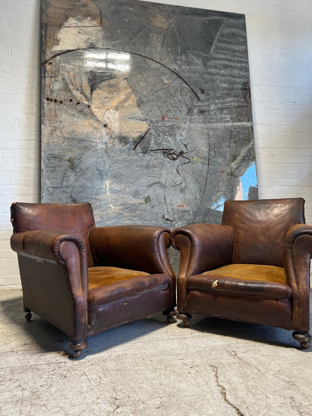 A Robust Pair of Edwardian Armchairs in Original Leather