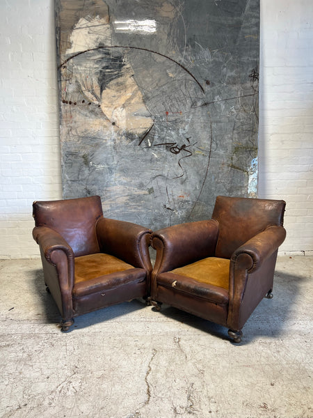 A Robust Pair of Edwardian Armchairs in Original Leather