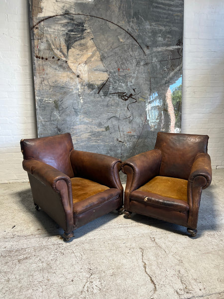 A Robust Pair of Edwardian Armchairs in Original Leather