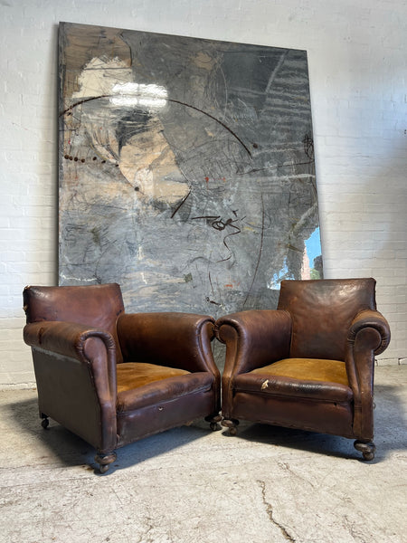 A Robust Pair of Edwardian Armchairs in Original Leather