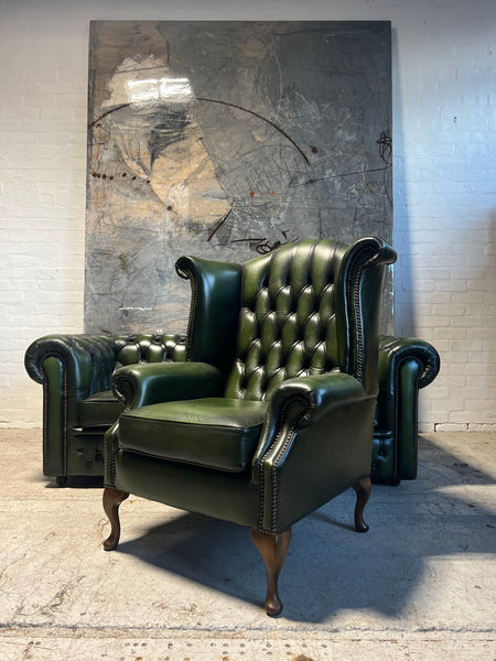 A Rich Green Leather Chesterfield Wing Back Chair