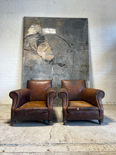 A Robust Pair of Edwardian Armchairs in Original Leather