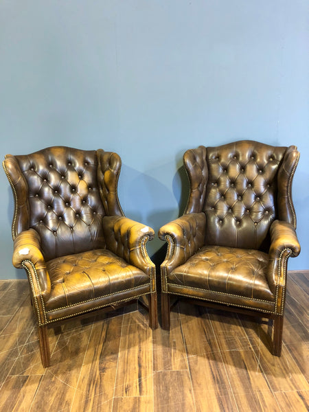 A Super Matching Pair of Vintage Leather Chesterfield Wing Back Chairs