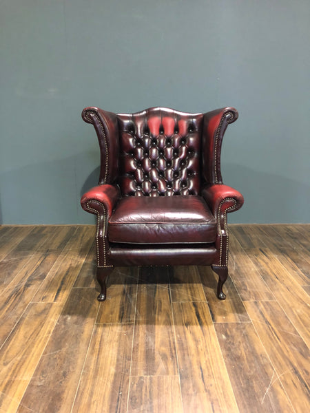 A Very Elegant Leather Chesterfield Wing Back Chair