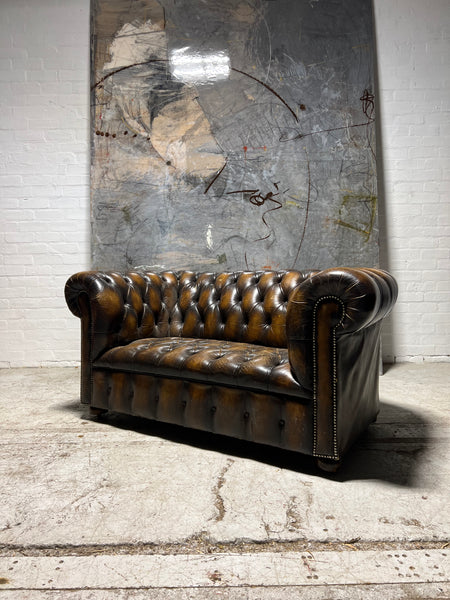 A Very Nice Twice Loved Vintage 2 Seat Leather Chesterfield Sofa in Dark Saddle Tan