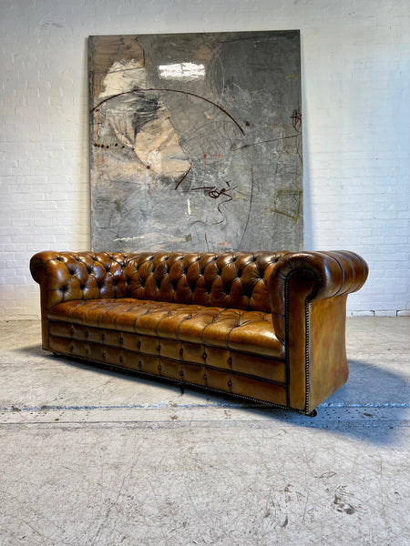 An Exceptional MidC Vintage Hand Dyed Leather Chesterfield Sofa (Matching Club Chairs Available)