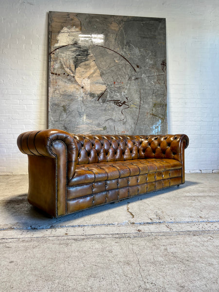 An Exceptional MidC Vintage Hand Dyed Leather Chesterfield Sofa (Matching Club Chairs Available)
