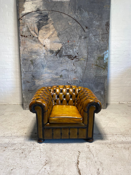 An amazing Matching Pair of Golden Tan MidC Chesterfield Club Chairs