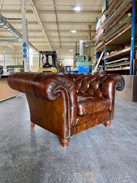 An Exceptionally Large Gentleman’s Club Chair in Hand Dyed Dark Walnut