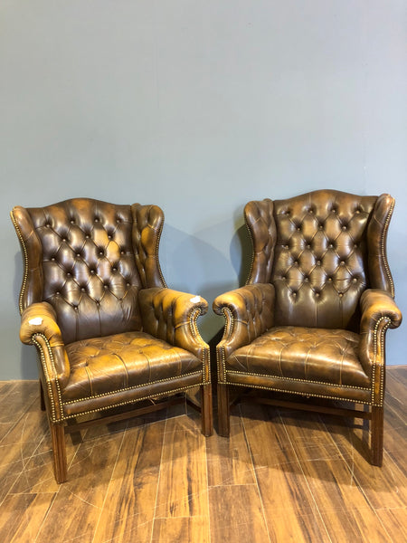 A Super Matching Pair of Vintage Leather Chesterfield Wing Back Chairs