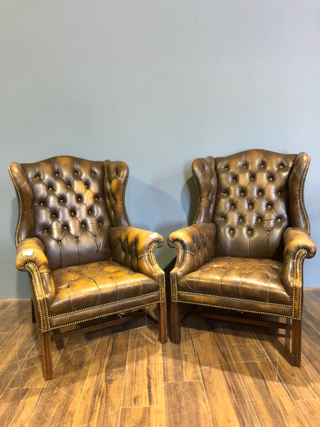 A Super Matching Pair of Vintage Leather Chesterfield Wing Back Chairs