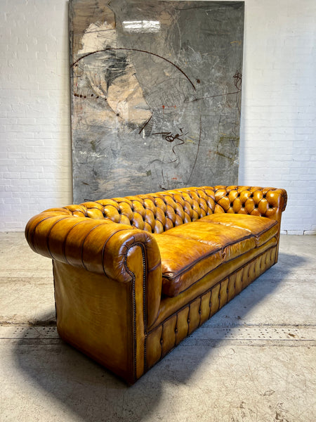 An Exceptional Autumn Gold Hand Dyed Leather Chesterfield Sofa