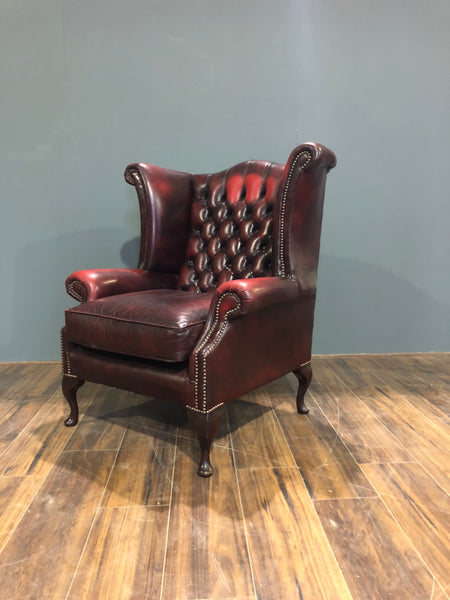 A Very Elegant Leather Chesterfield Wing Back Chair