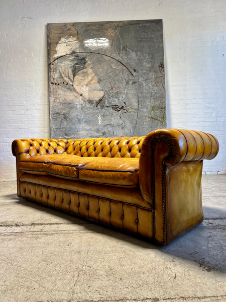 An Exceptional Autumn Gold Hand Dyed Leather Chesterfield Sofa