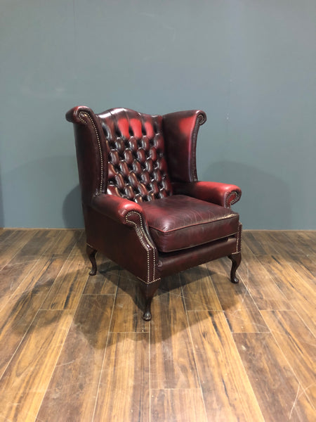 A Very Elegant Leather Chesterfield Wing Back Chair