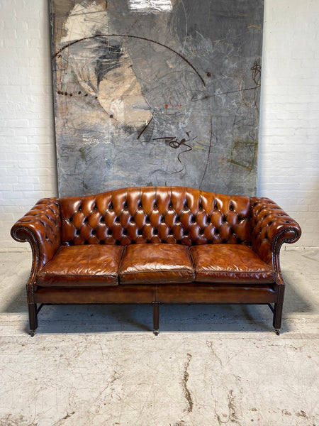 A Stunning MidC Chippendale Camel Back Hand Dyed Leather Sofa