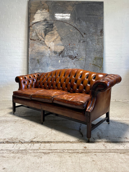 A Stunning MidC Chippendale Camel Back Hand Dyed Leather Sofa