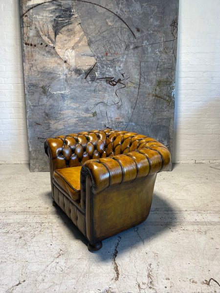 An amazing Matching Pair of Golden Tan MidC Chesterfield Club Chairs