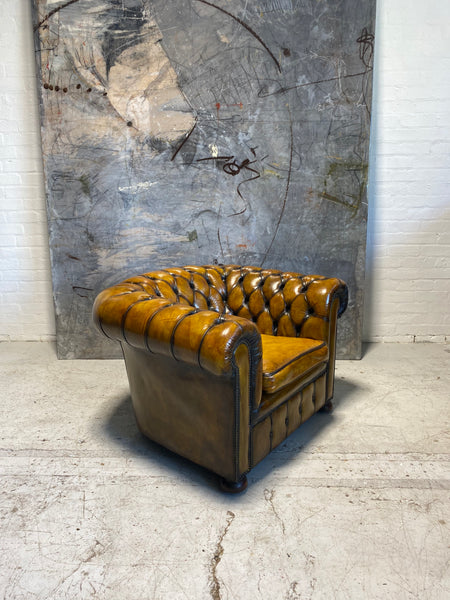 An amazing Matching Pair of Golden Tan MidC Chesterfield Club Chairs