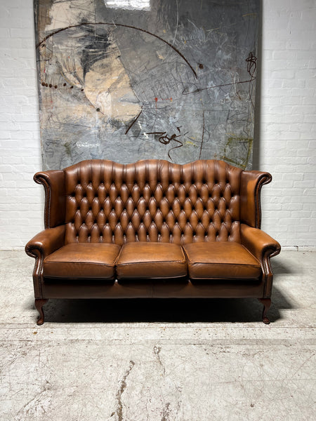 Beautiful Pair of Twice loved Chesterfield Wing Back Sofas in Caramel Tan