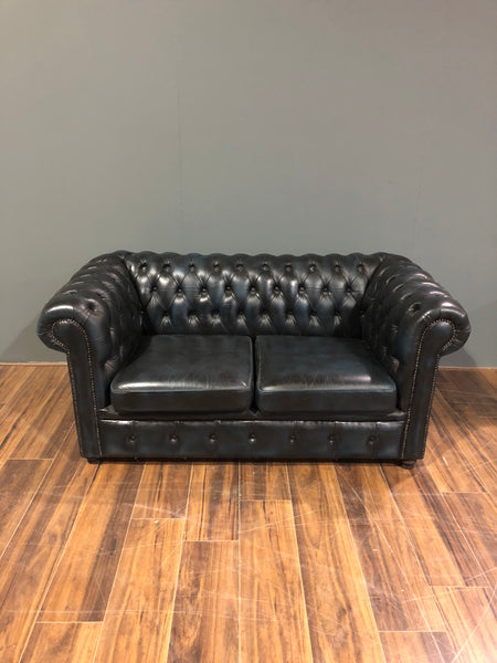 A lovely little 2 Seater Leather Sofa in Navy Blue