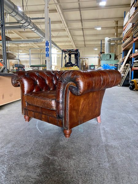 An Exceptionally Large Gentleman’s Club Chair in Hand Dyed Dark Walnut