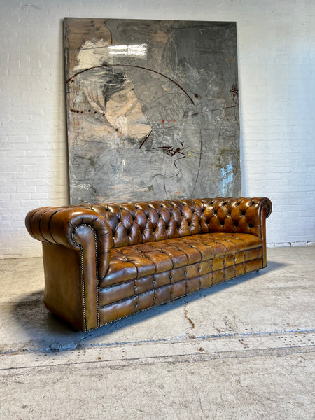 An Exceptional MidC Vintage Hand Dyed Leather Chesterfield Sofa (Matching Club Chairs Available)