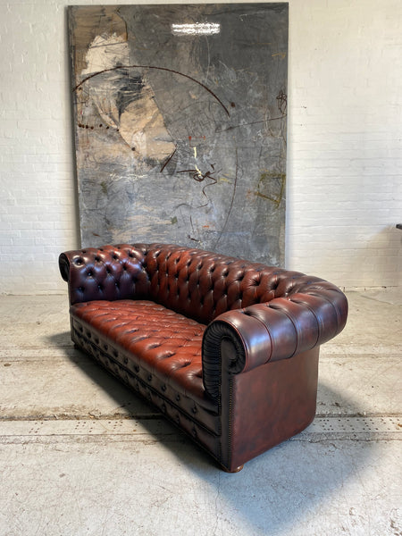 A Great Vintage MidC Chesterfield with Matching Club Chair
