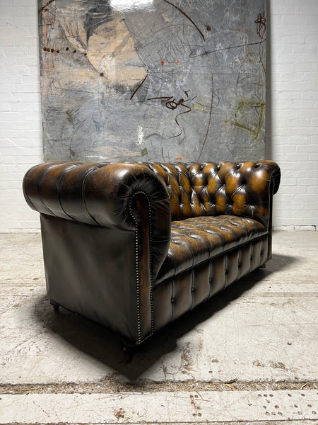 A Very Nice Twice Loved Vintage 2 Seat Leather Chesterfield Sofa in Dark Saddle Tan