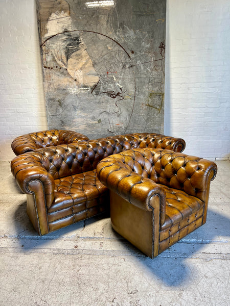 An Exceptional MidC Vintage Hand Dyed Leather Chesterfield Sofa (Matching Club Chairs Available)