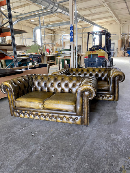A Very Cool Pair of 2 seat Chesterfield Sofas in Autumn Tans
