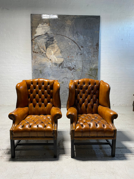 Exceptional Pair of MidC Wing Back Chairs
