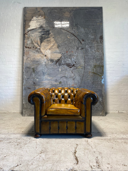 An amazing Matching Pair of Golden Tan MidC Chesterfield Club Chairs