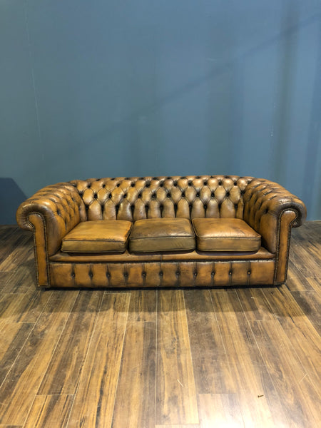 A Very Very Cool Matching Pair of Vintage Leather Chesterfield Sofas in a rustic Golden Tan