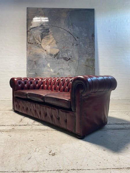 An Incredibly Rich Hand Dyed Vintage MidC Chesterfield Sofa