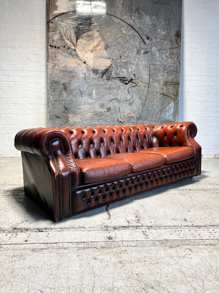 A Rich Chestnut Leather Chesterfield Sofa