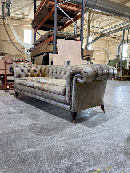 A very Smart 20thC Chesterfield Sofa in very Well Patinated Hand Dyed Leathers