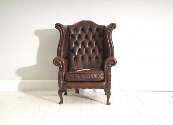 PAIR OF BROWN WING BACK CHAIRS : TO BE RESTORED