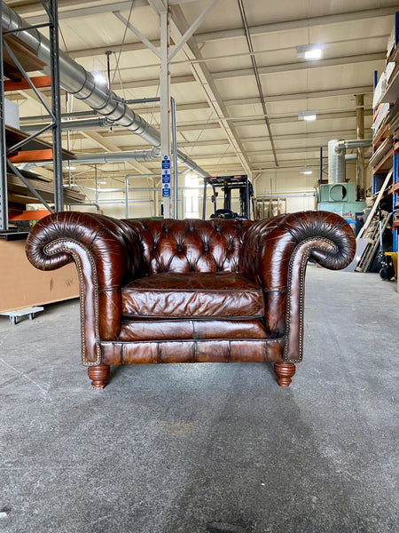 An Exceptionally Large Gentleman’s Club Chair in Hand Dyed Dark Walnut